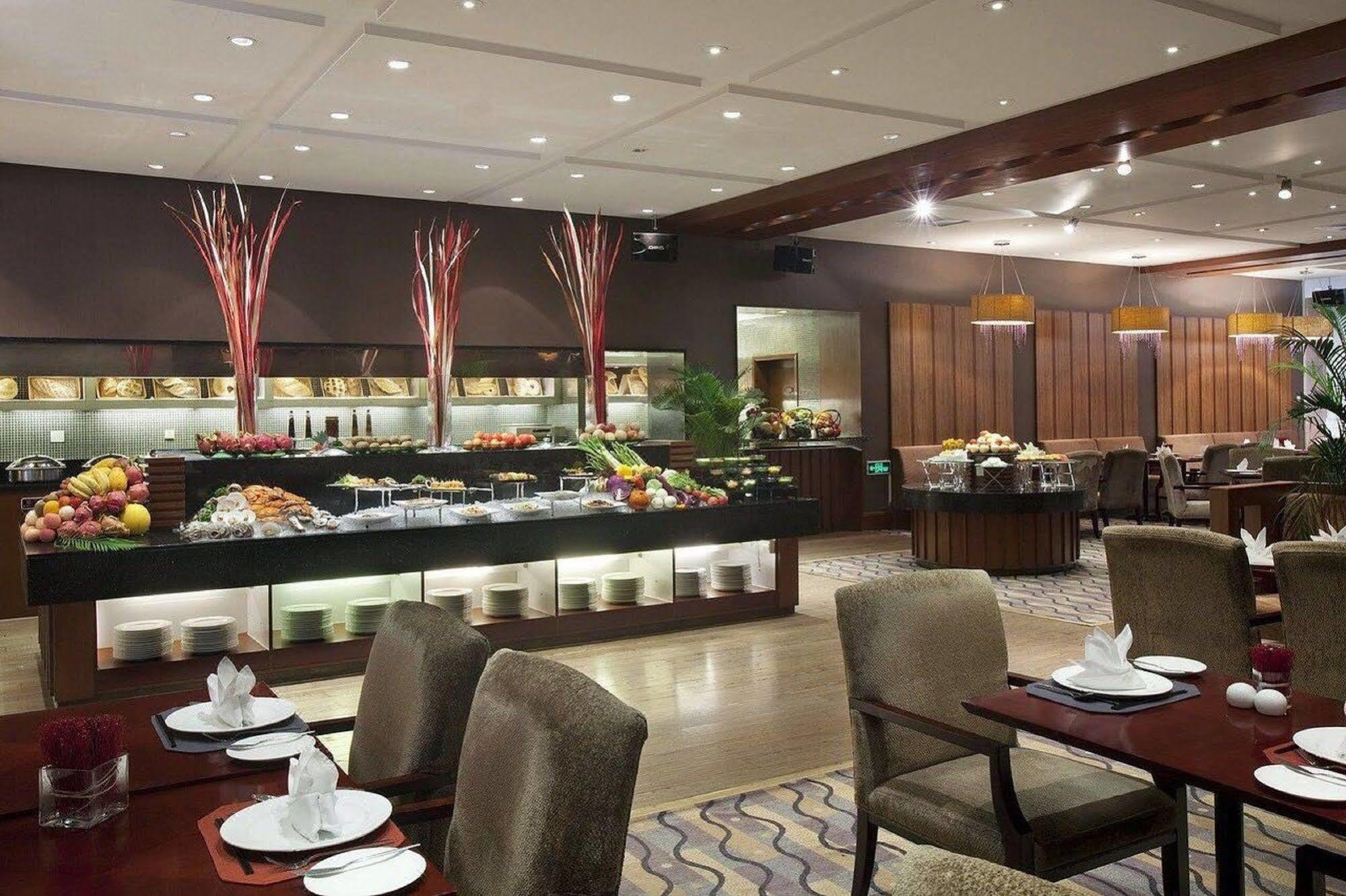 فندق هوليداي إن تيمبل أوف هيفين بكين المطعم الصورة